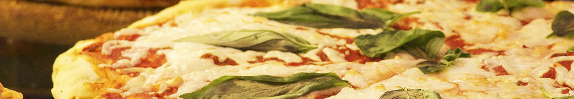 Eating Italian Pizza at Rossini's Italian Restaurant and Pizza restaurant in Cheshire, CT.